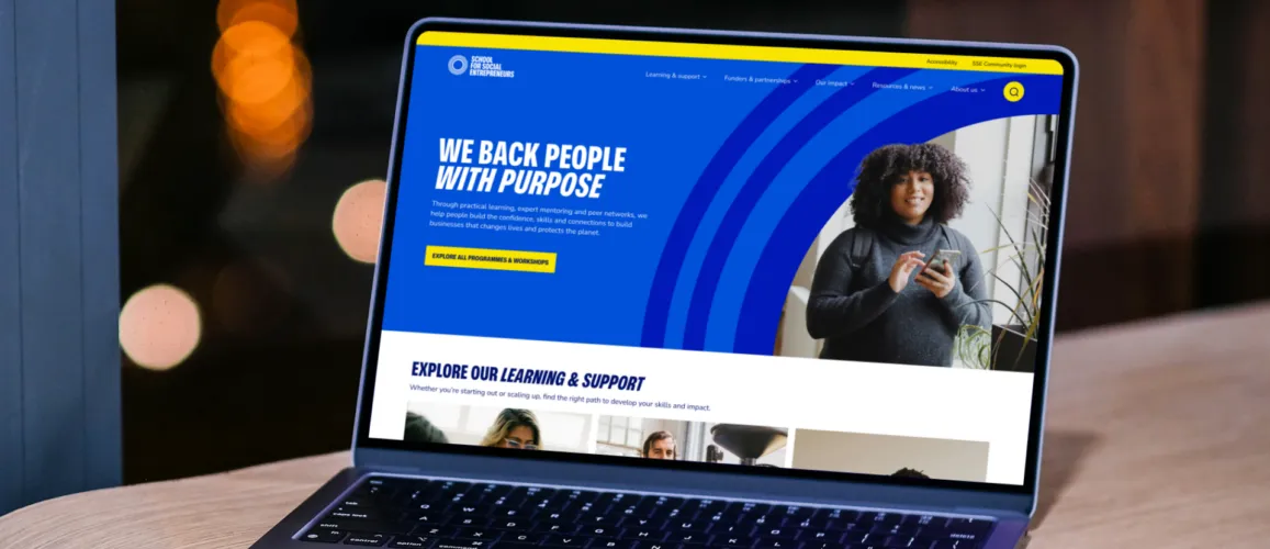 A laptop showing the SSE homepage.